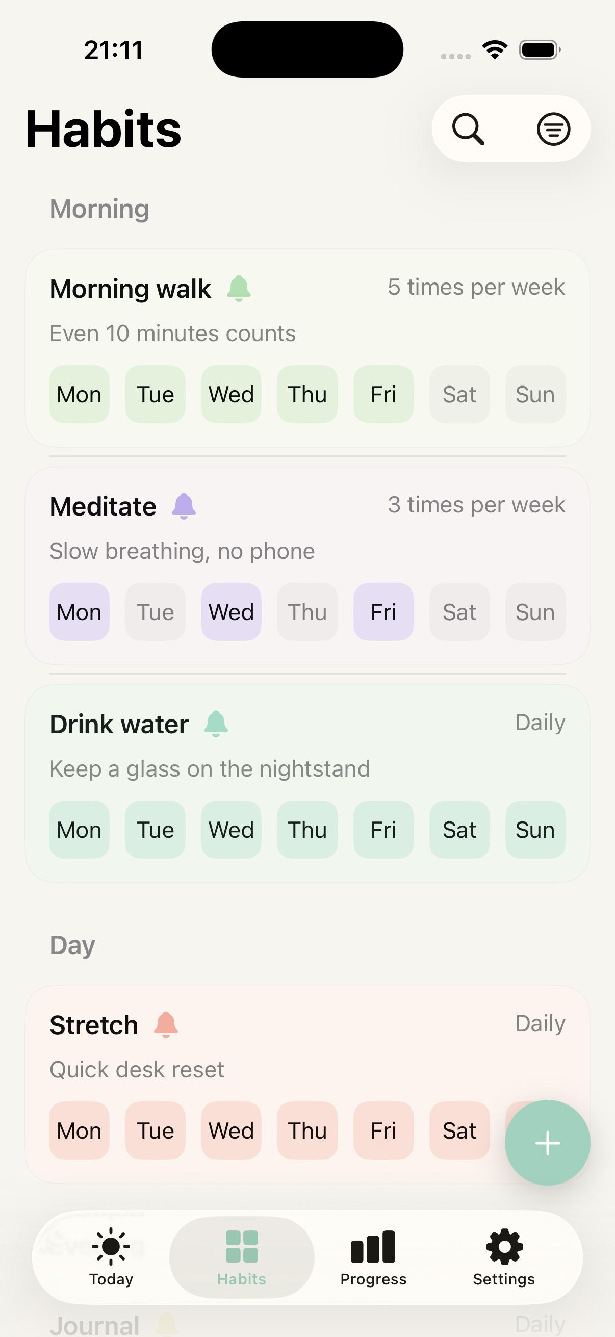 Habits list grouped by time of day with weekly day trackers